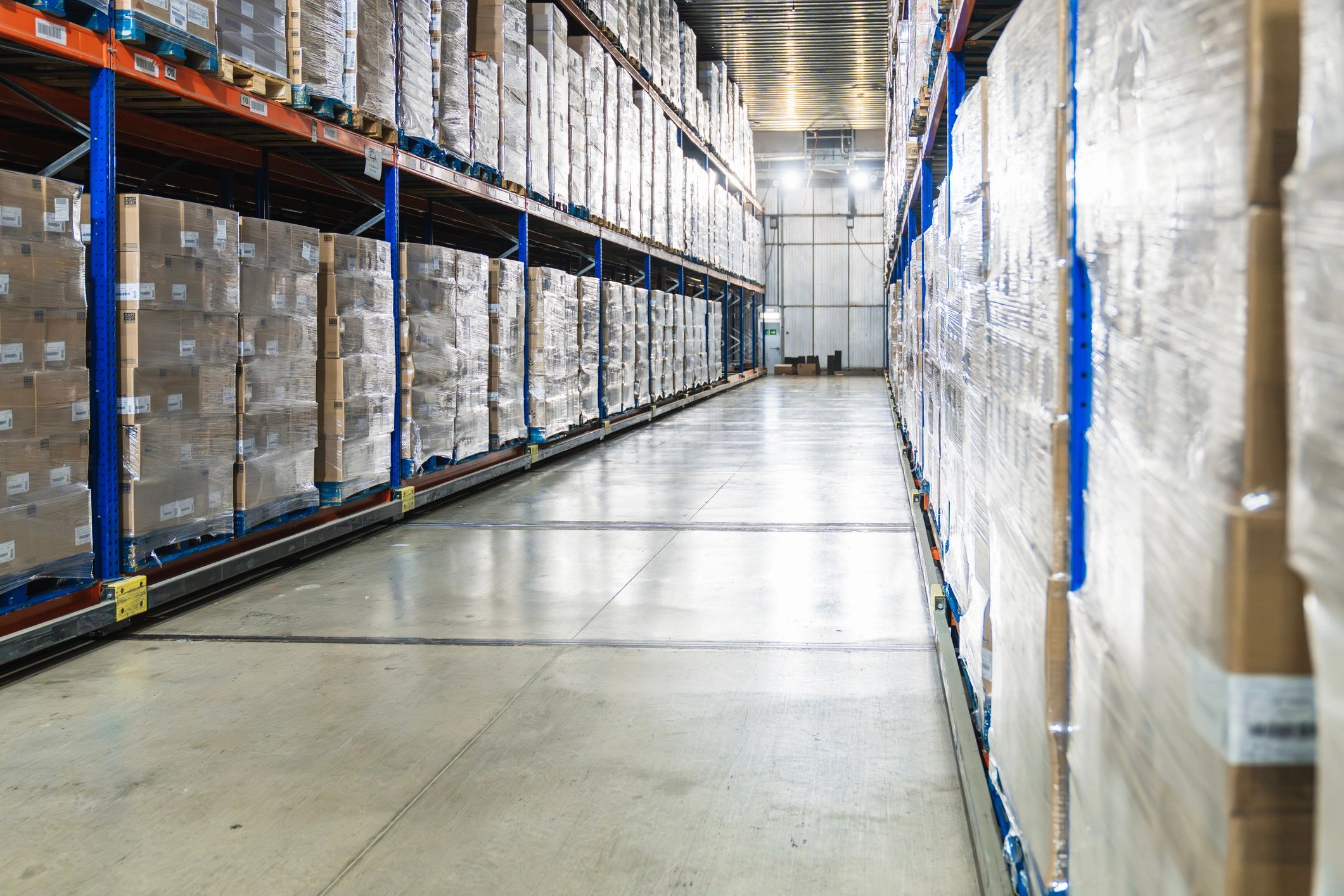 Cold storage logistics warehouse with pallets and boxes
