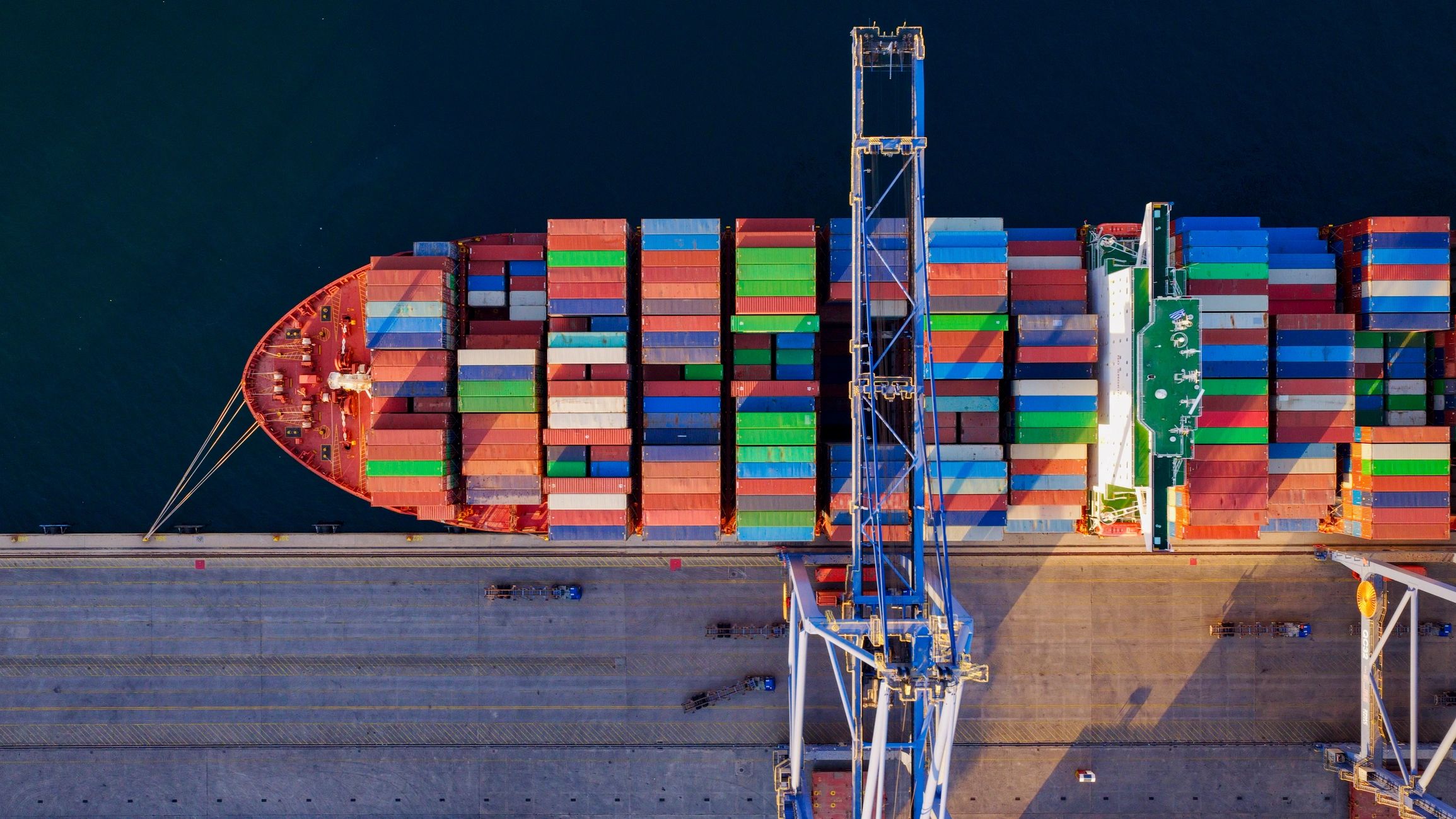 Container ship at commercial port supporting global logistics